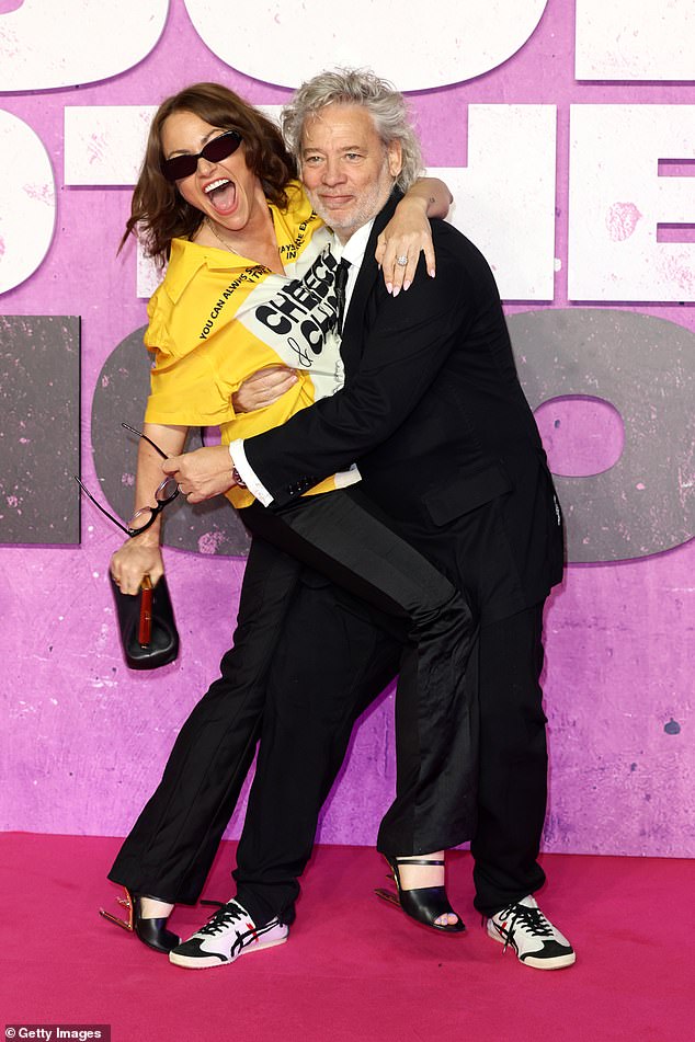 Entertainment: Jaime Winstone and Dexter Fletcher posed for a playful snap on the red carpet