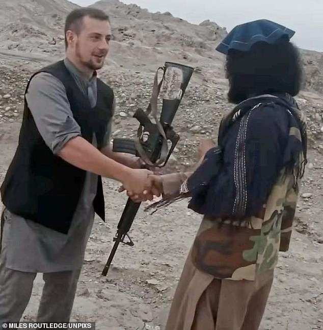 One of Miles' friends, who asked not to be named, said:  “I'm really worried about Miles right now.  No one has heard from him for weeks after he said he was arrested for withdrawing money from Western Union.  Miles is pictured meeting a Taliban fighter for one of his YouTube videos