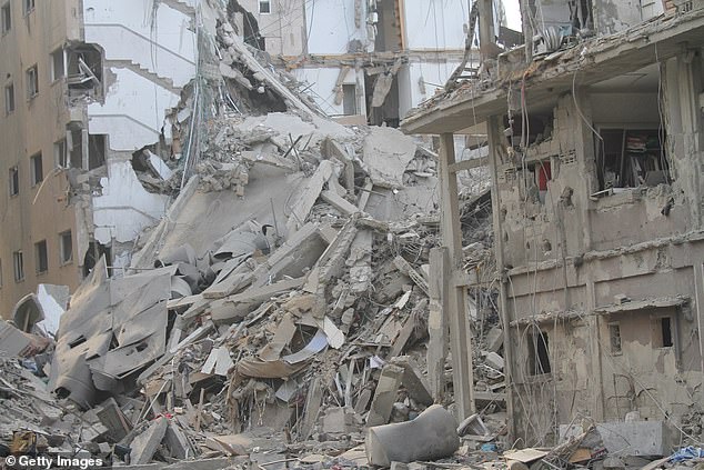 Buildings were damaged and destroyed by Israeli airstrikes in Gaza City