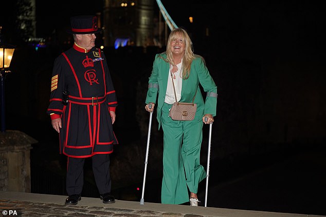 Still in style: Rod Stewart's wife still looked great despite her unknown injury