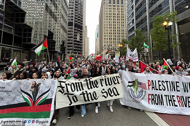 Supporters of the Palestinian cause march in downtown Chicago in the wake of this weekend's brutal terrorist attacks
