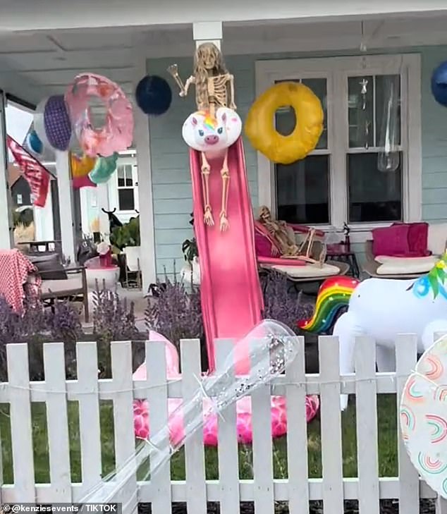 The Pool Party Barbie house had lots of hanging inflatables, including a unicorn and beach balls.  There is even a skeleton placed on top of a pink slide