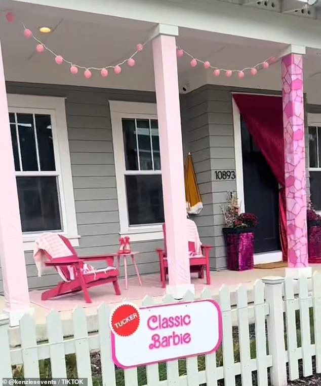 The Classic Barbie porch features hanging pink lanterns, fuchsia chairs and ornate pillars