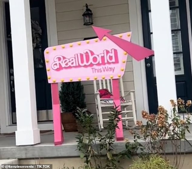 There's even a 'Real World This Way' sign in the shape of an arrow, the same way it appears in the movie when Barbie enters the 'real world'