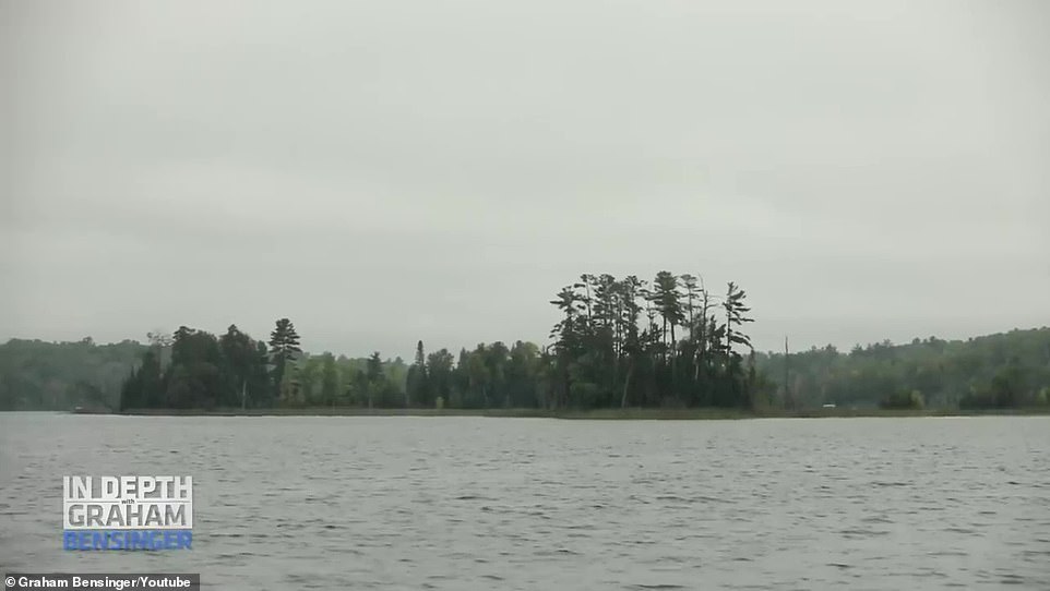 Waterfront Property: His cabins live along a large lake surrounded by lush trees