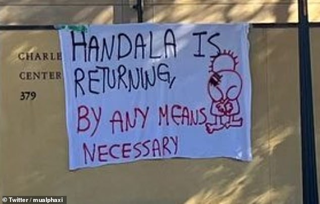 Referring to a cartoon character symbolic of Palestinian identity named Handala, one of the Stanford drapes reads: 'Handala returns, by any means necessary'