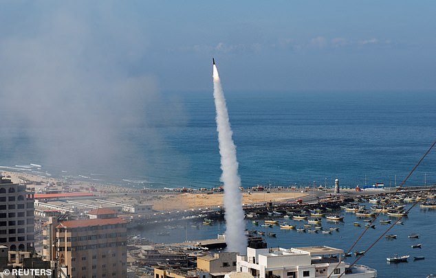 Rockets are fired by Palestinian militants into Israel in Gaza City on October 7, 2023