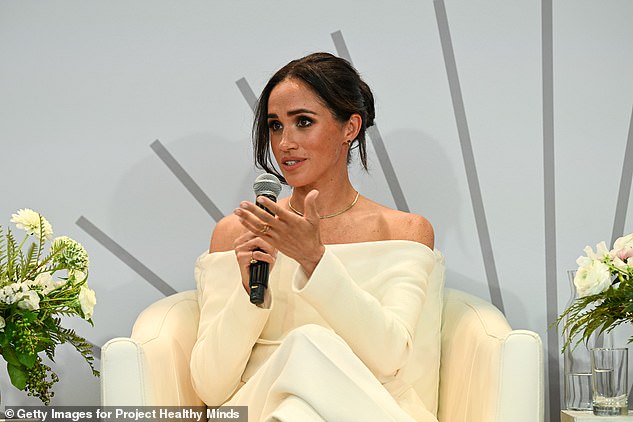 The Duchess of Sussex, 42, opted for an all-white outfit, a pair of Altuzarra 'Bendix' wide leg trousers, on sale now for £310.93 ($358.49) at Saks Fifth Avenue, and a off-the-shoulder Blazer by the same brand, for £625 ($895) on Modesens