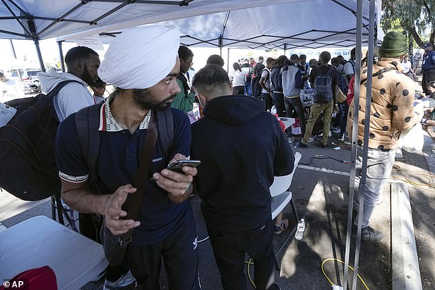 Aid groups say government support is needed, even for the services at the San Diego Transit Center parking lot