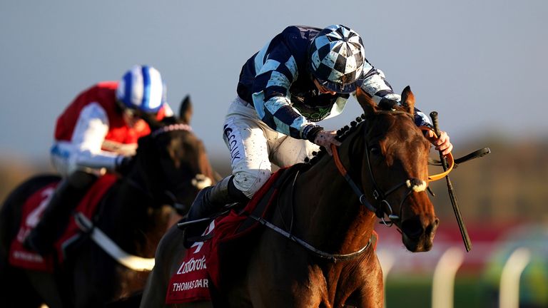 Thomas Darby walks away from On The Blind Side to win the Long Distance Hurdle at Newbury