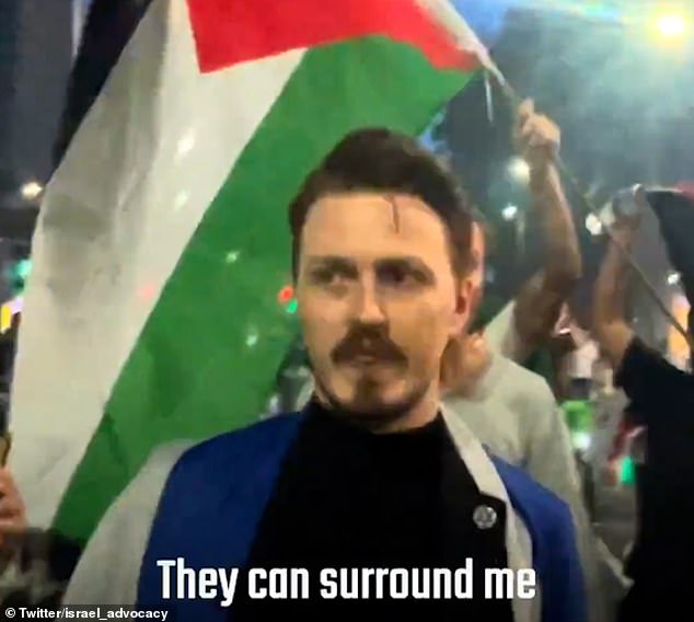 1697050740 259 Moment lone Jewish man bravely confronts Pro Palestinian supporters at anti Israel