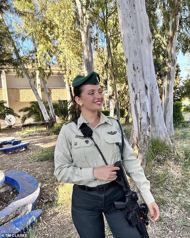 Ravit smiles in his uniform.  Commander Baruch Honig told the mourners.  “Ravit insisted on going in first.  He was killed, but he saved the unit, he saved the operation.