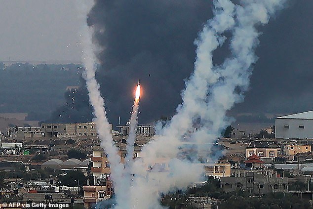 Palestinian militants fire rockets at Israel from Rafah, southern Gaza Strip, on October 11, 2023, as Israel continued to shell Hamas targets in the enclave