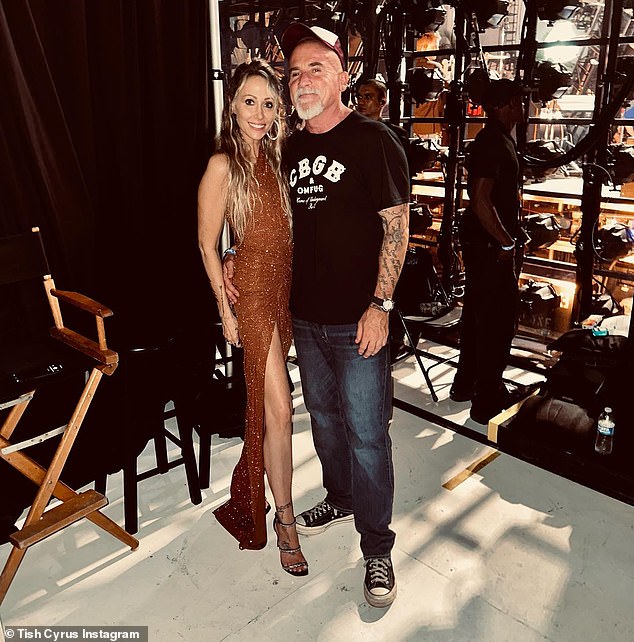 Moving on: Tish has also moved on with Dominic Purcell and the pair tied the knot in August in a romantic ceremony in Malibu - with daughter Miley serving as maid of honor