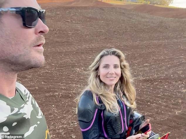 Elsa shared a series of photos on Instagram posing with her husband Chris and one of their sons near a dirt bike