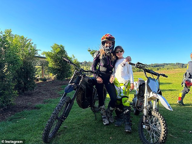 In another picture, the actress wore motocross gear as she laughed alongside her daughter India Rose before hitting the track