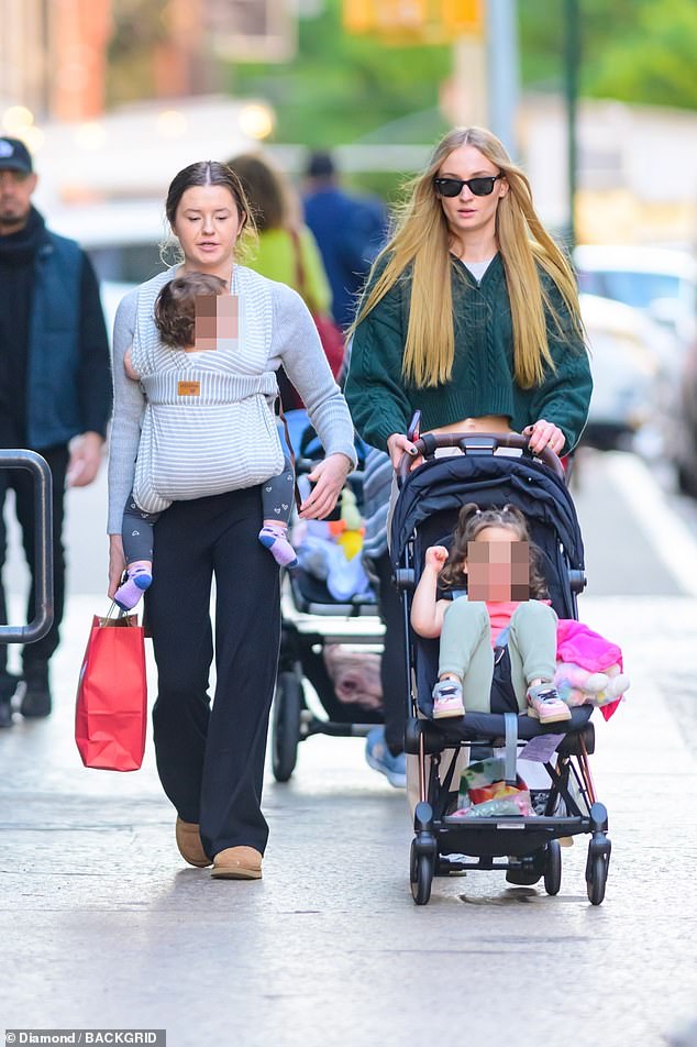 1697068392 214 Sophie Turner looks jovial as she steps out in NYC