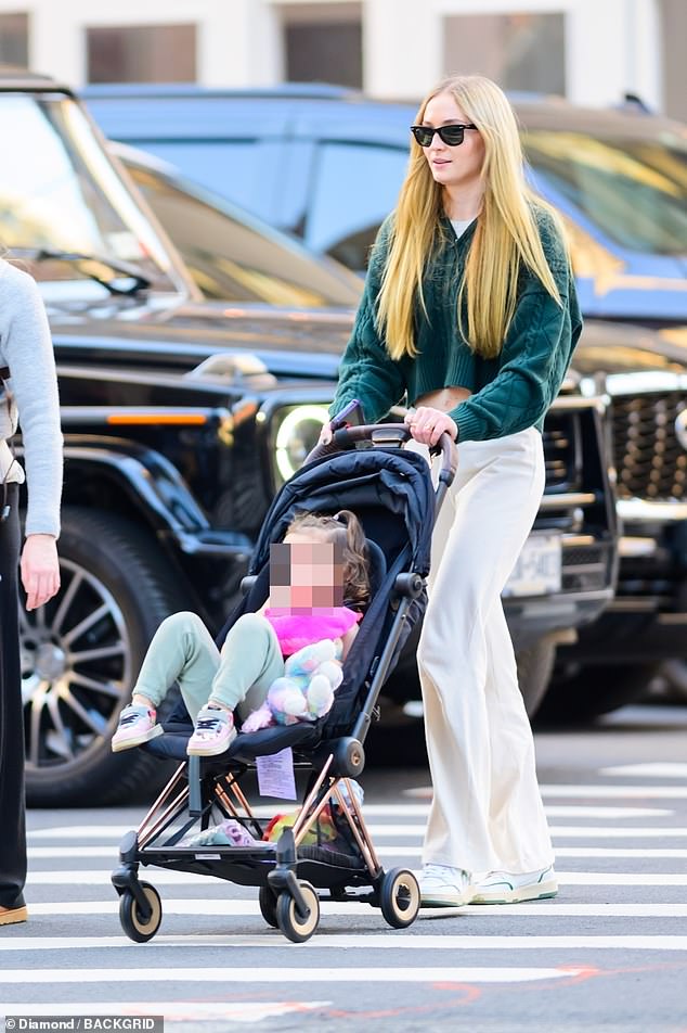 1697068394 149 Sophie Turner looks jovial as she steps out in NYC