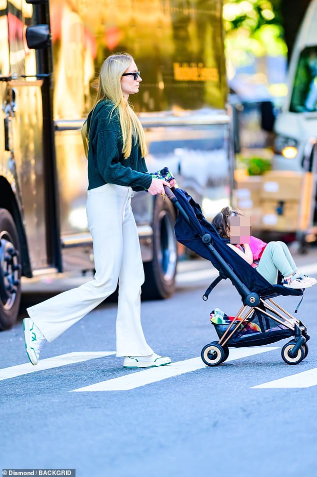 1697068396 821 Sophie Turner looks jovial as she steps out in NYC