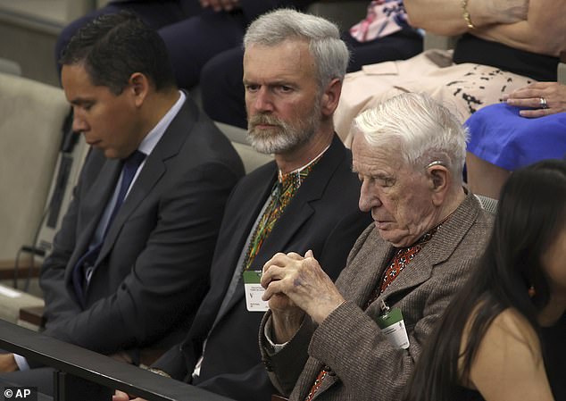 Professor Foster said virtue signaling could lead to blunders such as the Canadian parliament applauding ex-Ukrainian soldier Yaroslav Hunka (pictured right) who turned out to have fought for the Nazi elite Waffen-SS, a unit associated with atrocities many of the Second World War.