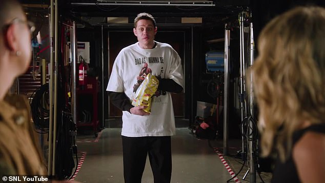 Surprise: Pete suddenly appears in the studio, snacking on a bag of salty potato chips.  