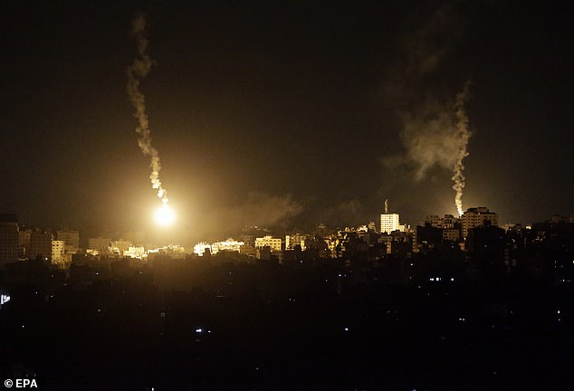 An Israeli army flare lights up the sky above the northern Gaza Strip on Friday