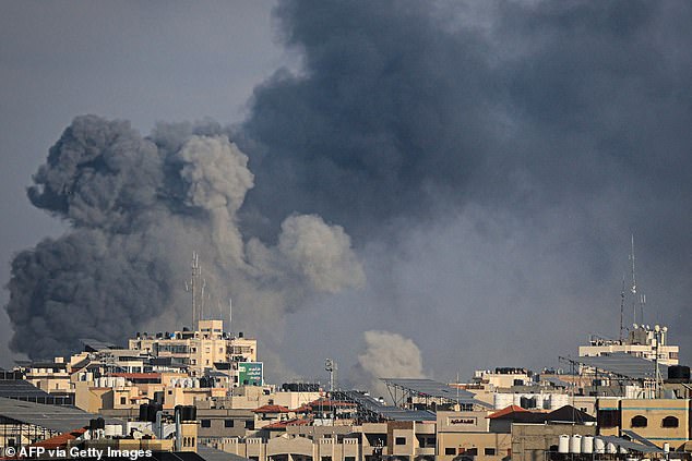 Smoke billows during Israeli attacks on Gaza City on Tuesday