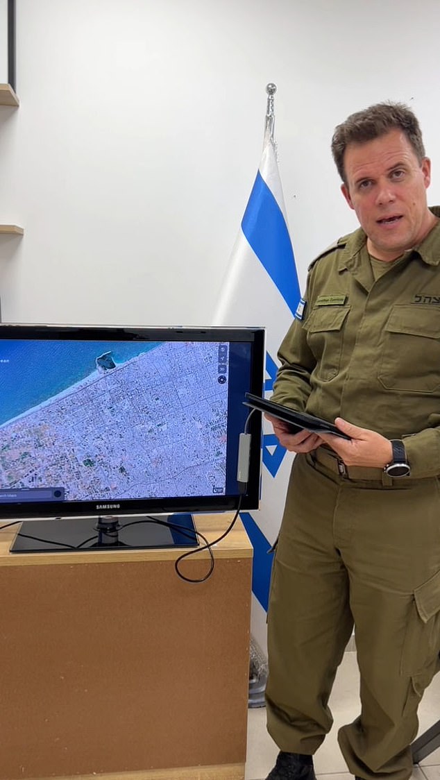 Jonathan Conricus, a spokesman for the IDF, is seen giving an update in the early hours of Thursday