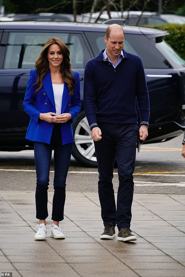 The Prince of Wales matched his wife in different shades of blue as he opted for navy while Kate opted for a royal blue blazer.