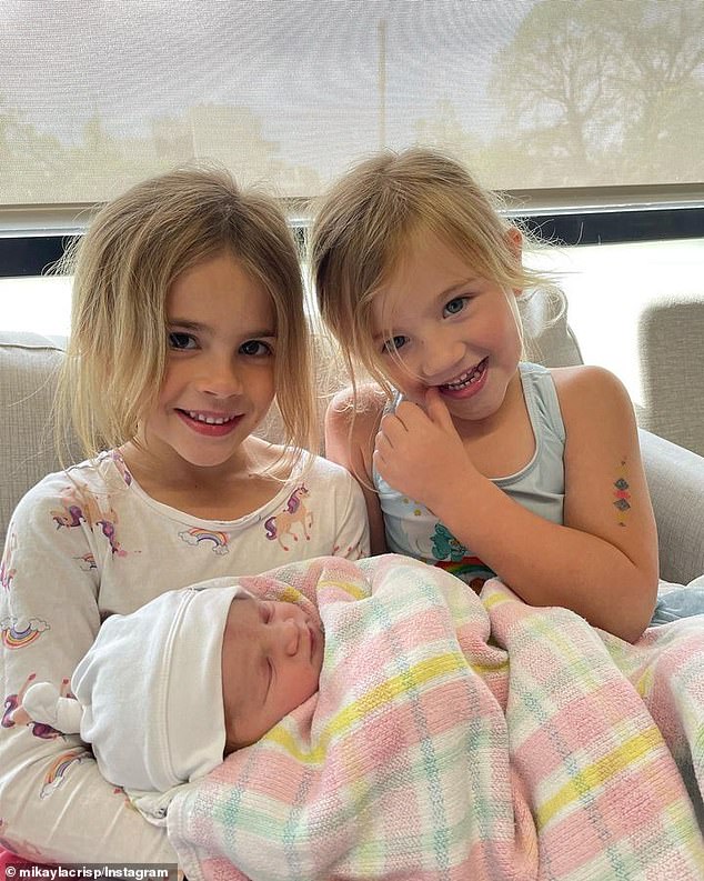 The couple also shared some images of the newborn with her two sisters