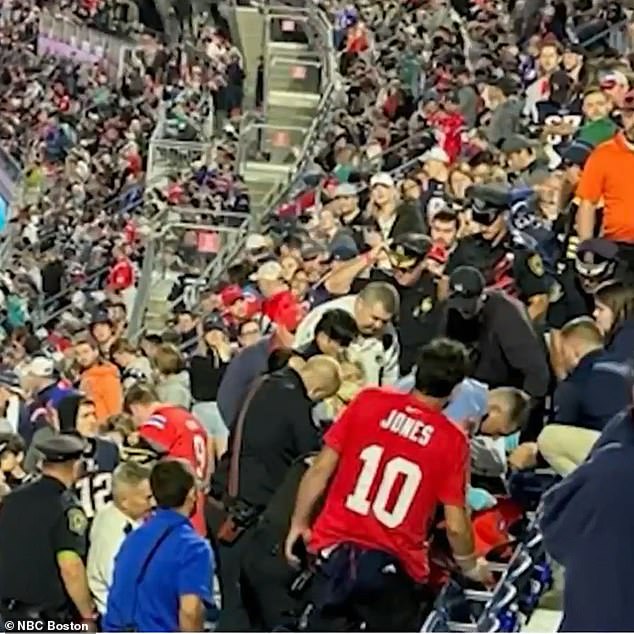 Videos from the Foxborough arena show security guards trying to break up a fight, and medics administering CPR shortly afterward, as worried fans look on.