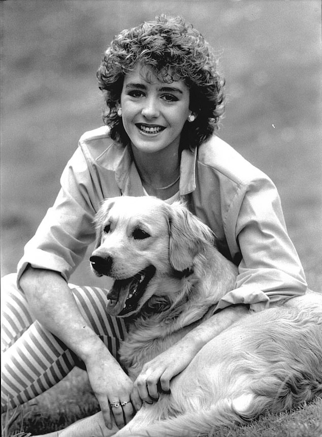 Scary: The TV personality said the responsibility of looking after Bonnie, who was one of Blue Peter's second litter of dogs, Goldie, was daunting (pictured together in 1987)