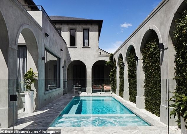 After the construction was completed, the space was transformed into an oasis of entertainment, with plastered stones, a magnesium pool and an open kitchen.