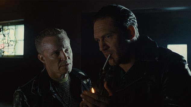 Damon Herriman as Brucie and Tom Hardy as the biker gang's founder and leader Danny in The Bikeriders directed by Jeff Nichols