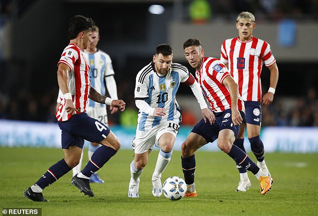 Messi and Paraguay's Alvaro Campuzano face off in a World Cup qualifying match on Thursday night