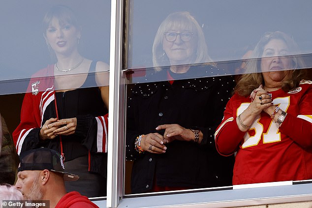 Close to the people: The You Belong With Me hitmaker, 33, watched the Kansas City Chiefs take on the Denver Broncos at Arrowhead Stadium alongside Don