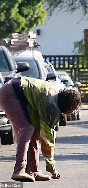 At one point during her trip, Sasha appeared to stoop to the ground to pick something up, but she may have just been adjusting her shoes.