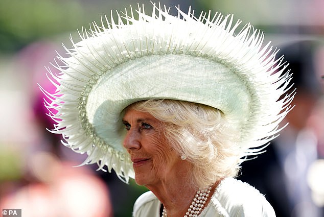 The Queen's mint colored hat on day three of Ascot was a beautiful sight and she teamed it beautifully with a matching dress and a pearl necklace