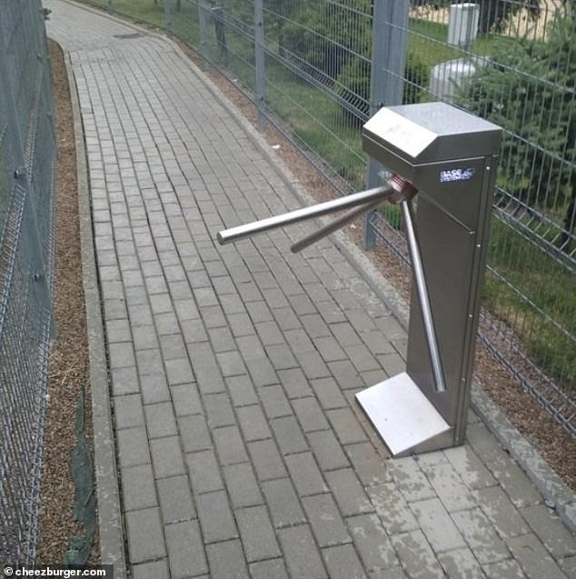 No entry!  Sort of... a turnstile is placed in the middle of an open path where people can walk around it