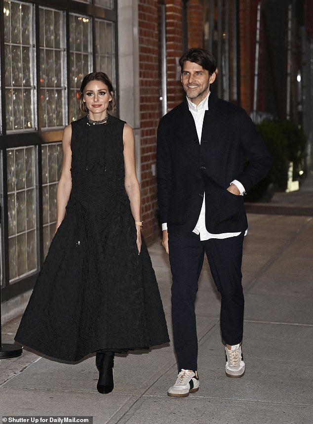 Cute couple: Fashion influencer Olivia Palermo also made a splash at the under-the-radar launch party.  By her side was her chiseled husband Johannes Huebl, who is a model and designer