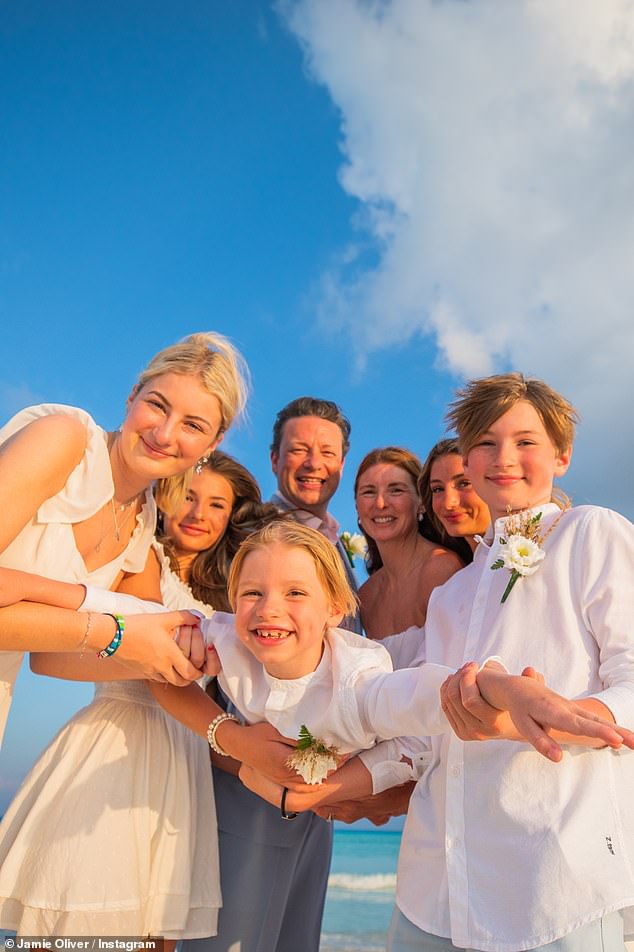 Romantic: They renewed their vows in April on a beach in the Maldives surrounded by their children