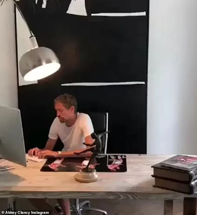 Inside the home office: The model, 37, and the ex-England player, 42, bought their £3million flat in 2016 (Peter pictured in his home office)