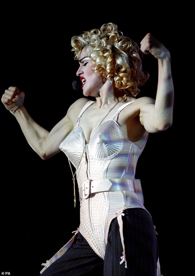 Queen of Pop: It's going to be a tough choice as Madonna first hit the UK charts with Holiday in 1984 and has had 13 number ones and 71 hits (pictured in 1990)