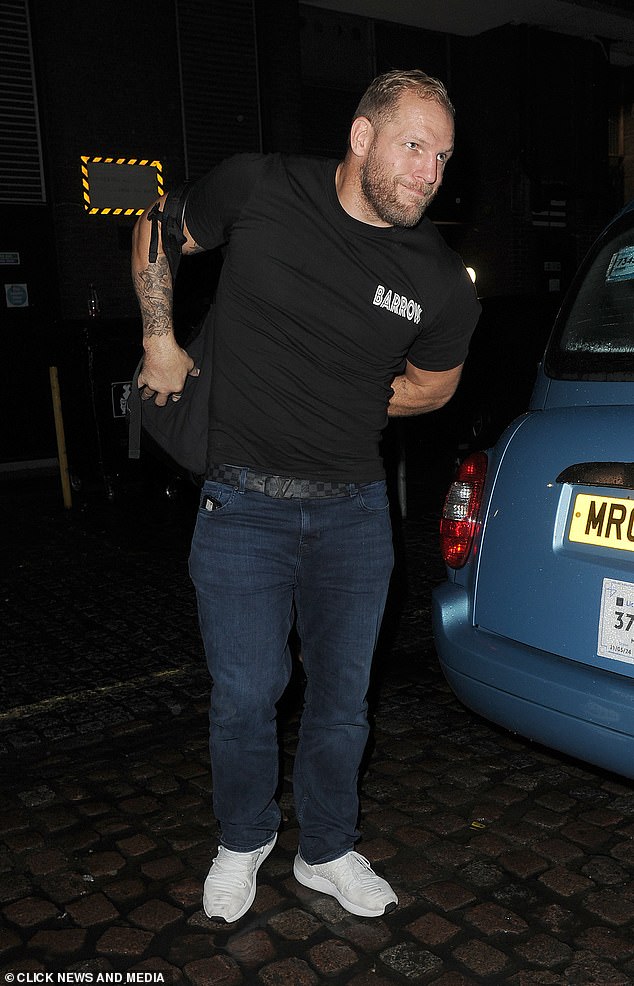 Chewing the fat: Dressed in a £113 Barrow T-shirt with a neon smiley face print, James looked like he was having fun as he chatted outside before getting into a taxi