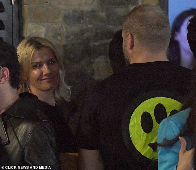 Chat: James was deep in conversation with the blonde beauty, who bore a striking resemblance to his wife Chloe