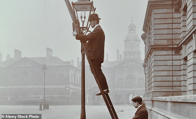 Not walking under stairs and avoiding black cats are just some of the superstitions people take part in to keep luck on their side on Friday the 13th. Pictured: Two men test gas pressure in street lighting, Westminster, London, 1910