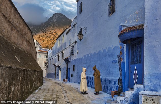 Morocco expects to surpass its pre-pandemic tourism level, welcoming 13 million people to the country by the end of the year.  Above is Chefchaouen, where one YouTuber said he found the people to be 'very friendly'