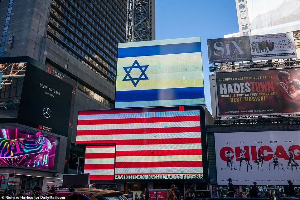 An Israeli flag is displayed in New York's Times Square on Friday ahead of scheduled pro-Palestine protests this afternoon