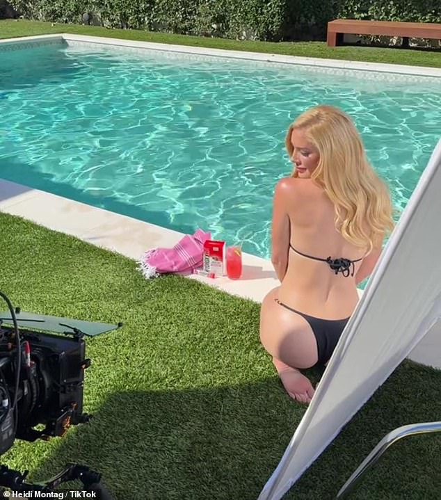 Flaunting her weight loss: In the caption of the first snap of herself kneeling by the pool and posing next to the products, she wrote that she had lost 22 kilos