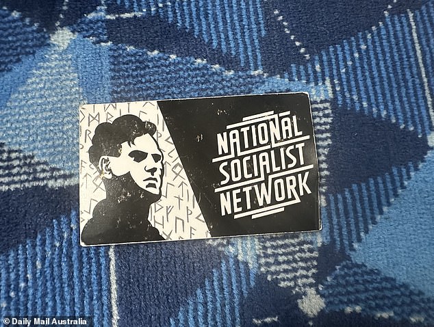 On the train, the group attempted to hand out 'business cards' for the National Socialist Network to the small group of other passengers heading home